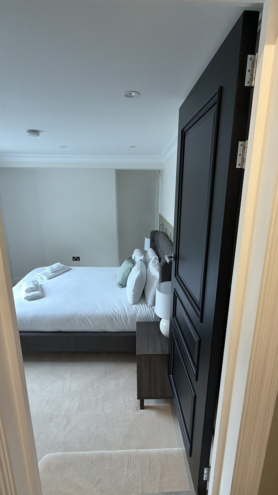 Second bedroom with fitted dark wardrobes — Flat 2.